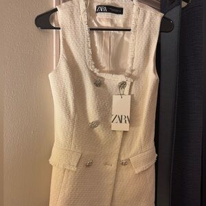 Elegant Cream Tweed Jacket with Silver Accents